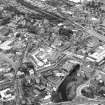 General oblique aerial view of Paisley centred on the High Street with town hall adjacent, taken from the SE