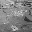 Oblique aerial view of Buddon Camp with the early 20th Century gun battery in the foreground.  Also visible is the modern main camp, 19th Century gunnery room and other ancilliary buildings.
