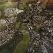 Oblique aerial view of Crieff centred on the bridge and manse, taken from the S.