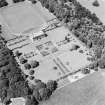 Oblique aerial view of Kinross House country house with garden, gate and burial ground visible, taken from the SE.