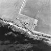 Oblique aerial view of Orkney, Burray, Second World War Northfield coastal battery and the Broch of Burray taken from the NNW.