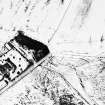 Oblique aerial view under snow, from ENE.