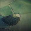 Oblique aerial view centred on the remains of the recumbent stone circle, taken from the NW.