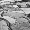 Dalginross, oblique aerial view, taken from the WSW, centred on the cropmarks of the Roman Temporary camp. The Roman fort is visible in the centre left of the photograph.