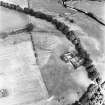 Waulkmill, oblique aerial view, taken from the S, centred on the cropmarks of a fort.