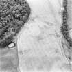 Hill of Redhall, oblique aerial view, taken from the W, centred on the cropmarks of an enclosure.