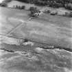 Carlops, Spittal, oblique aerial view, taken from the WNW, centred on the interior of a Roman temporary camp and the cropmark of a ring-ditch.