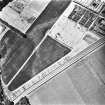 Melville Nurseries, ring-ditch and linear cropmarks: oblique air photograph.