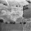 Oblique aerial view centred on the cropmarks of the settlement, taken from the SW.