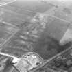 Howe Mire, settlement, coal sinks and cropmarks: oblique air photograph