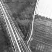 Howe Mire, coal pits, cropmarks and field boundary: oblique air photograph