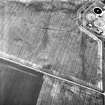 Howe Mire, settlement, coal pits and cropmarks: oblique air photograph