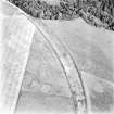 Caddonlee, oblique aerial view, taken from the WSW, centred on the cropmarks of an enclosure.