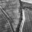 Oblique aerial view centred on the cropmarks of the possible enclosure, taken from the S.