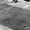 Kaeheughs, Barney Mains, enclosure and pit-alignments: oblique air photograph of cropmarks.