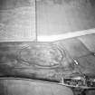 Oblique aerial view centred on the cropmarks of the fort, taken from the S.