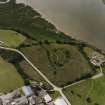Oblique aerial view of Kirkcudbright Castle centred on earthworks, taken from the NE.