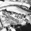 Raeburnfoot, oblique aerial view, taken from the NE, centred on a Roman Fort and ring-enclosures.