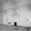 Interior view of Fullarton House showing second floor north room with plasterwork and fireplace.