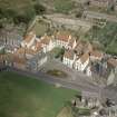 Oblique aerial view of Culross Palace and area around Sandhaven