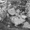 Excavation photograph : querns (in situ?)