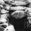 Excavation photograph : souterrain lintels from SE end.