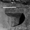 Excavation photograph - Area 5: close up of pit F033 partially excavated