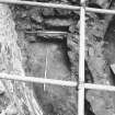Excavation photograph : bottom of stair that led from W side of tower to upper level(s) of building, from S.