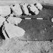 Excavation photograph : trench IIIa - feature CAA, cutting 2 and rocks CDD.
