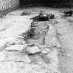 Excavation photograph : trench 2/5, linear cut f150 partially excavated, from E.
