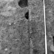 Excavation photograph : section across slot f468, from W.