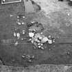 Excavation photograph : F1006 - cluster of stones in AW.