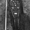 Excavation photograph : area M - general view of skeleton in grave cut 1115.
