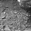 Excavation photograph: area X/H - flagstones and cobbles f1388, totally excavated, from east.