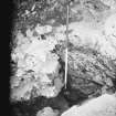 Excavation photograph: area H/X - detail of corner of 1066 and cross wall showing plaster.