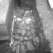 Yester, St Bathan's Chapel (Yester Chapel): Excavation photograph - Wall footings at the S end of Trench 4 - from S