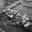 Excavation of Block B - W door with blocking in situ.