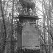Statue of a stag at unidentified location within the Pitfour Estate, insc. 'The Deer, Pitfour'