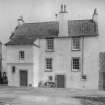 General view of front of Gyles House, Pittenweem, with motorbike.