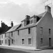 General view of 3 and 5 West Street and 14 Station Road, St Monance, from the east.