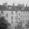 View of the rear of the buildings on the East side of George Square, Edinburgh, seen from the South East. These are possibly the buildings demolished to make way for the William Robertson Building and the David Hume Tower.