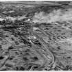 Photographic copy of 1947: Oblique aerial view from SE of Ardeer, showing Cordite Department (foreground), Detonators (right), Blasting (left), and Nitric Acid and Nitro-cotton (top left).  (See also Overlay 'D' for details [D 10471])