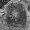 View of gravestone inscribed 'IG IG TG MG' 1754 in the churchyard of Old Logie Church.