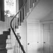 Interior view of Newton House showing staircase from front hall.
