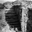 Excavation photograph : north stairs, with staircase entrance on right.
