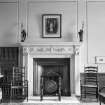 Interior view of Auchincruive House showing fireplace in room.