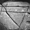 Ogham Stone with carved footprint (flash picture).