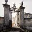 View from E showing ornamental gates to south terrace