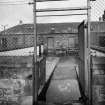View of yard and gates from SW.