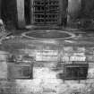Interior.
Feed room, detail of vats.